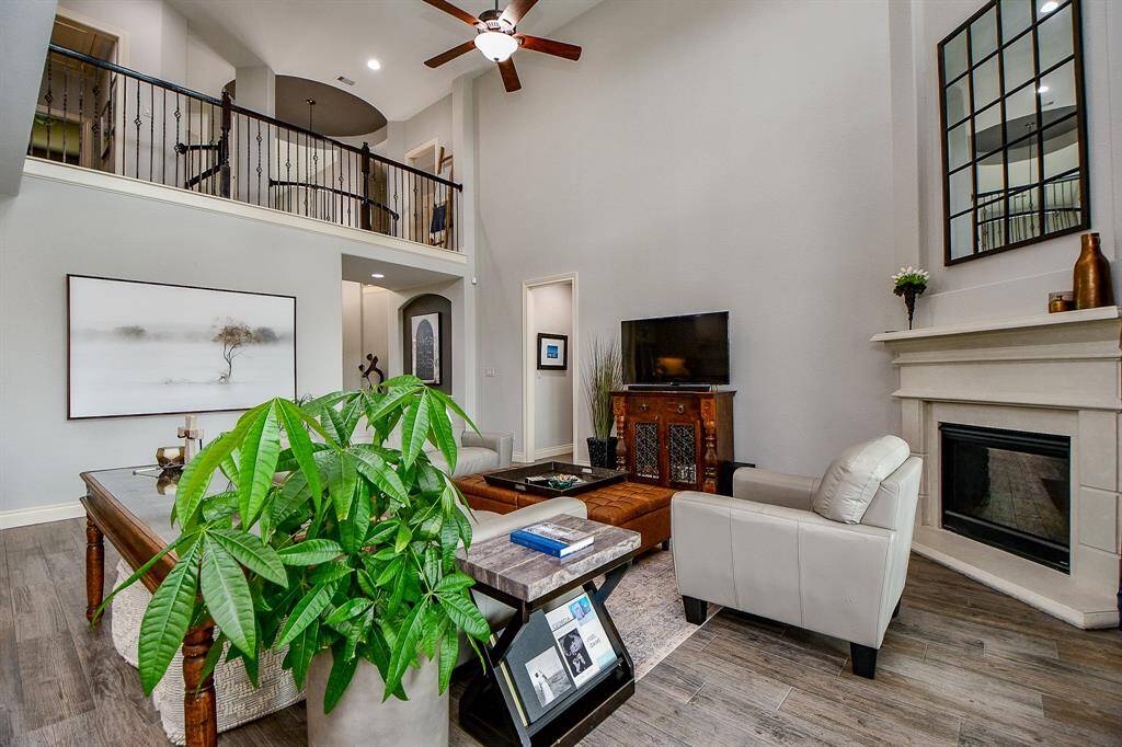 Standing at the back of the family room you can see the rotunda that gives architectural flair to this home.
