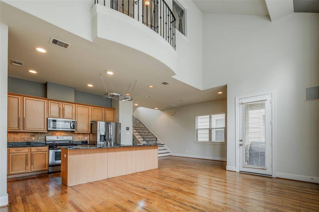 Notice the high ceilings and natural bright light from large windows