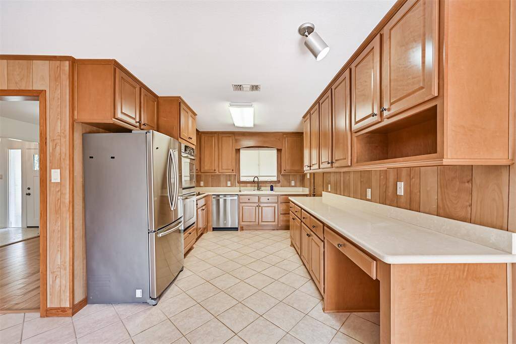 Kitchen with abundant storage and workspace