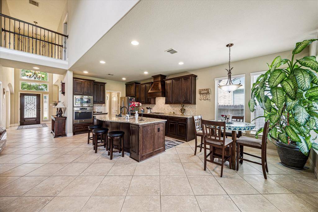 The kitchen is seamlessly connected to the family room making entertaining or family meals a breeze!
