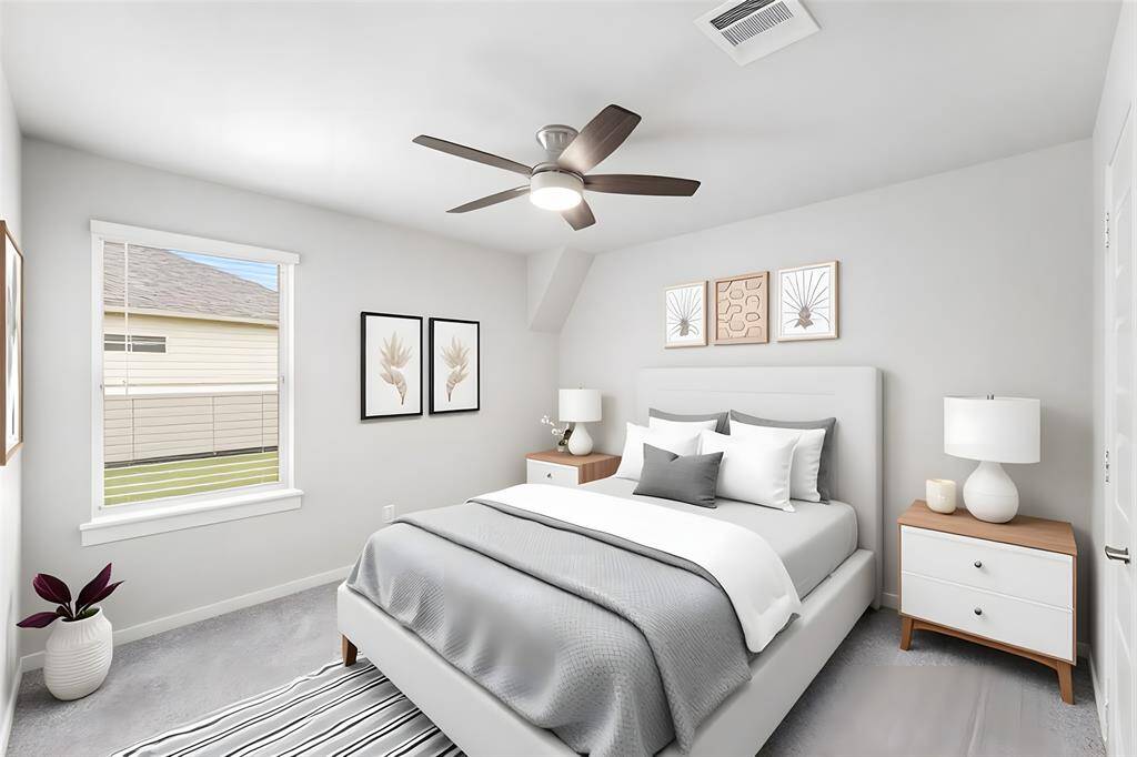Here, also virtually staged, Bedroom 2 of 4 is cozy and comfortable.