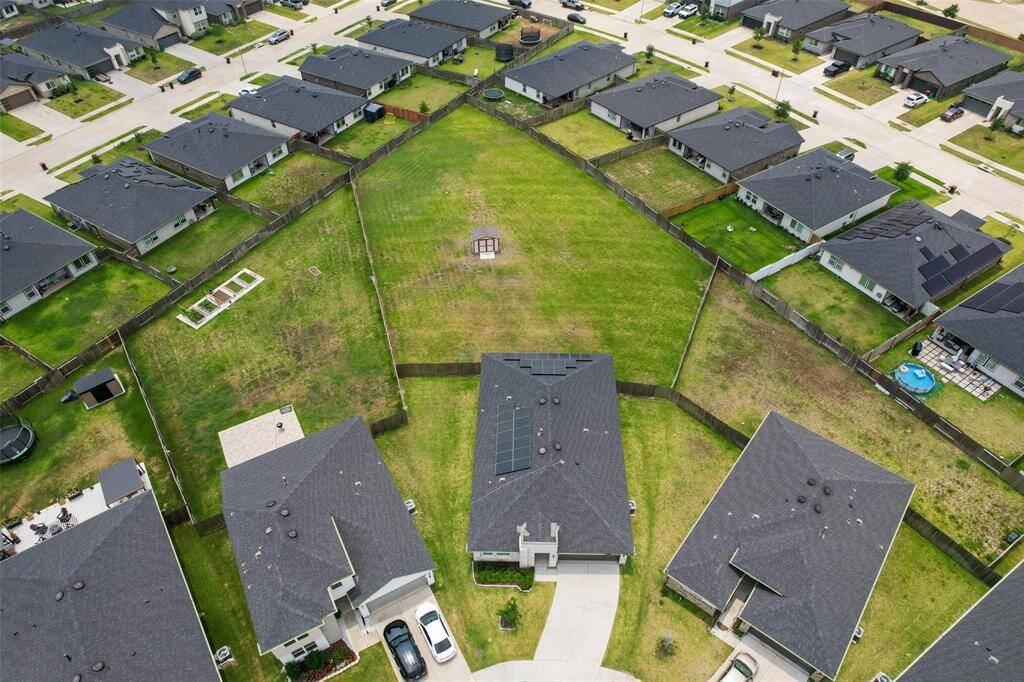 Amazingly, this .58 acre lot has an automatic sprinkler system covering the entire yard, both front and back, making watering the grass very easy.