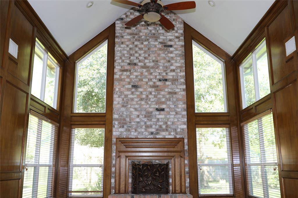 Living room with cathedral ceiline