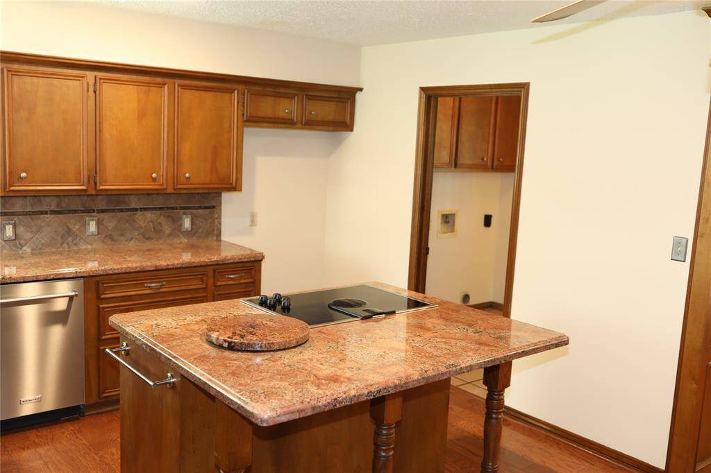 Kitchen Island leading to laundry room
