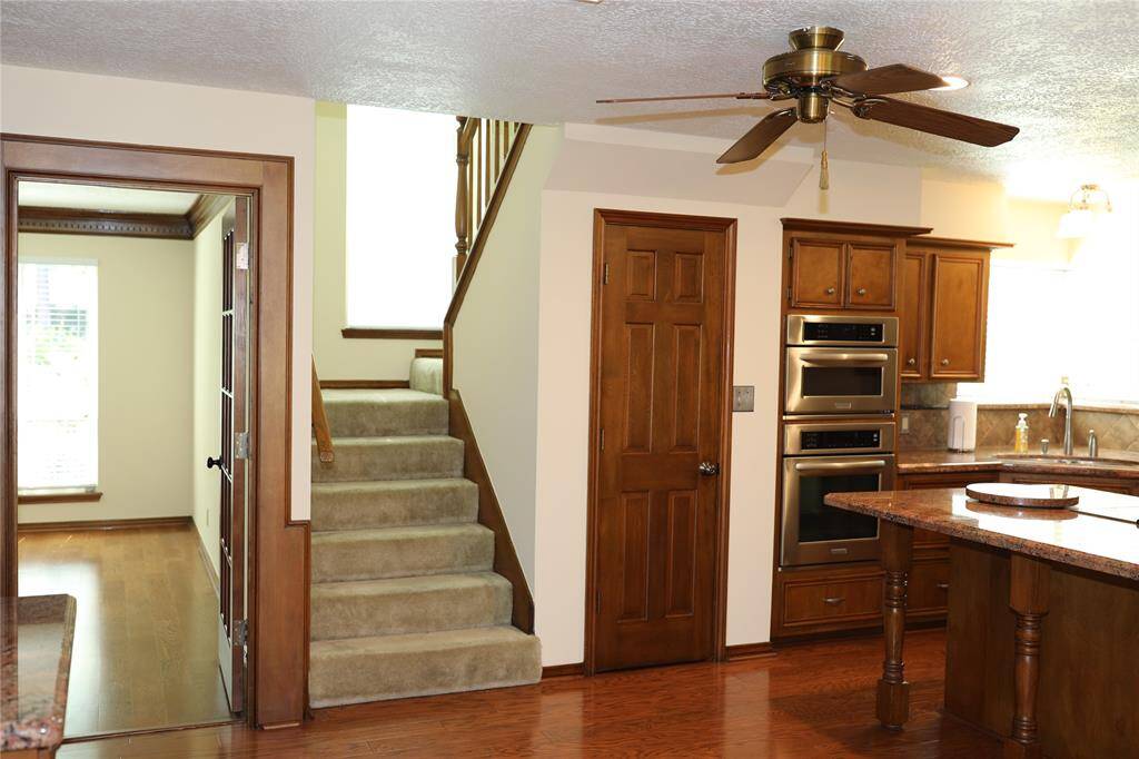 Stairwell off kitchen