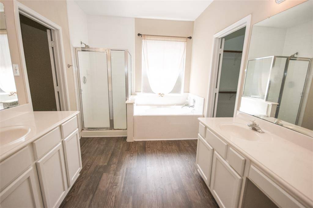 HUGE PRIMARY BATH WITH SEPARATE SHOWER AND GARDEN TUB