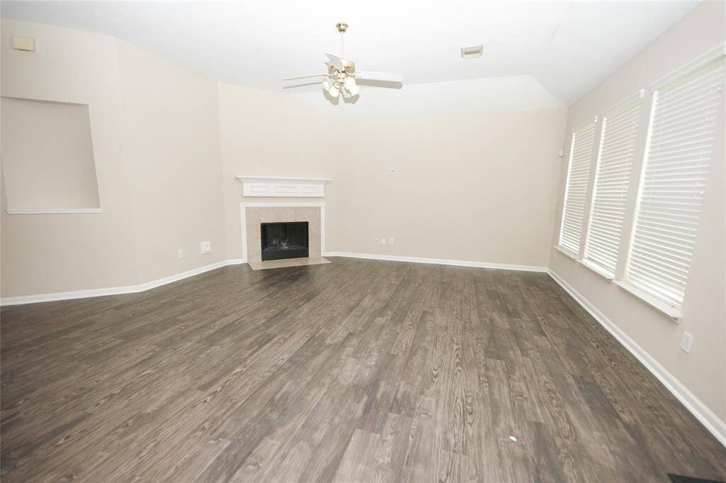 HUGE DEN WITH CORNER FIREPLACE