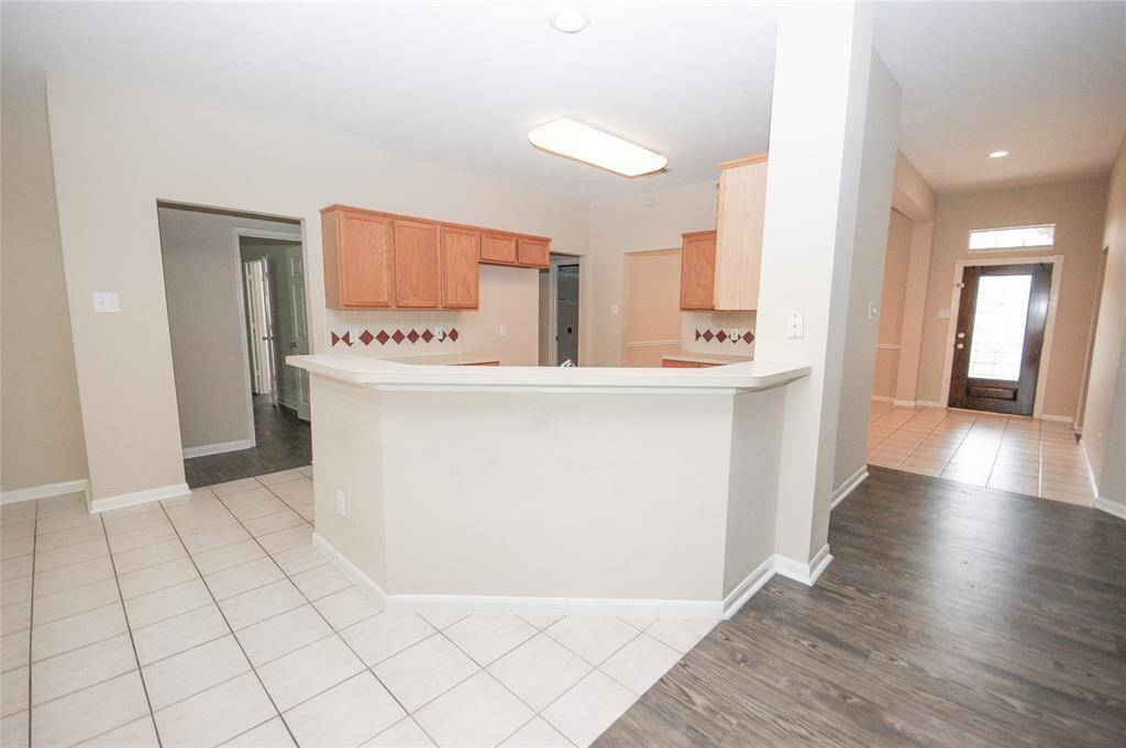 VIEW OF BREAKFAST BAR FROM DEN