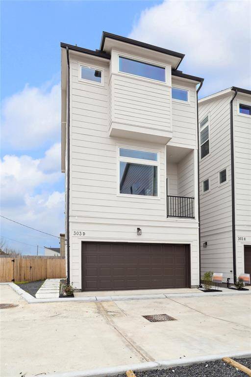Discover your new modern oasis! This sleek, contemporary home boasts expansive windows, a spacious garage, and a stylish facade, perfect for your lifestyle.