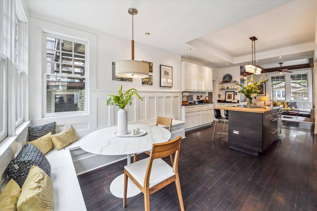 Think of all the beautiful meals you will share in this lovely dining room featuring high ceilings and an abundance of windows.