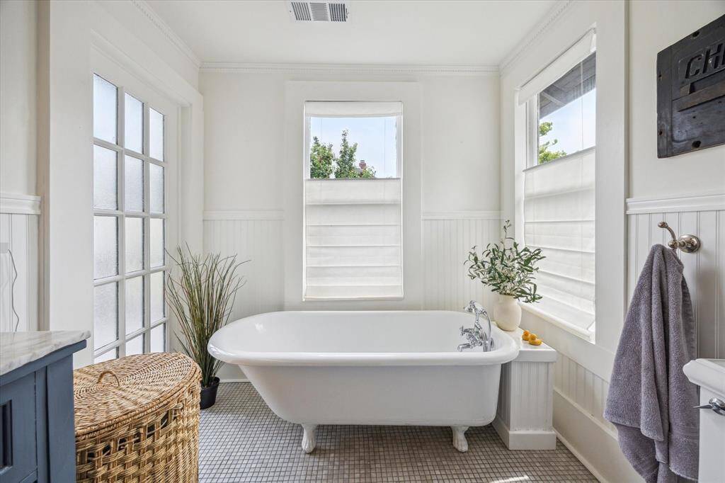 The quartz topped double vanity and separate shower in the primary bath.