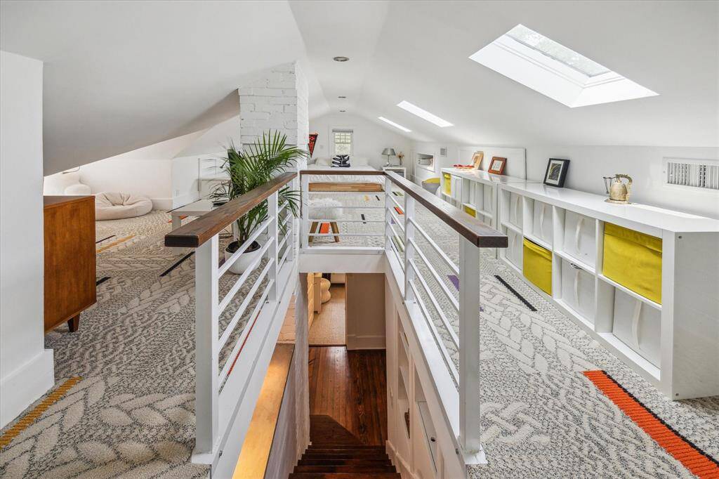 This light and bright secondary bedroom has a large closet and plenty of windows.