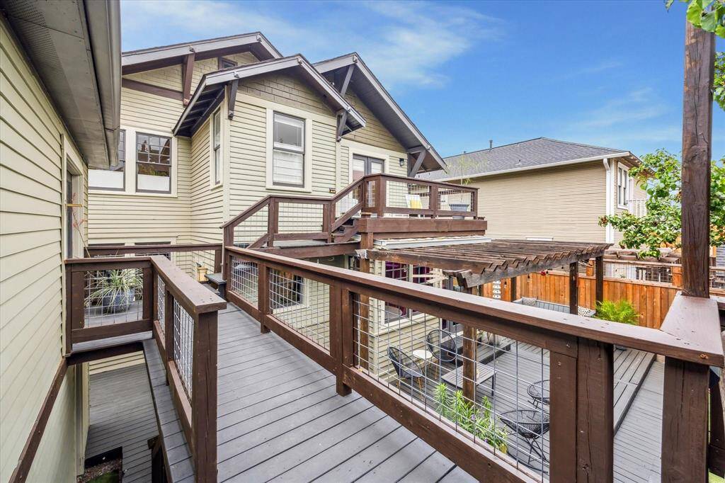 The restful outdoor space is perfect for a morning coffee or lounging with friends.