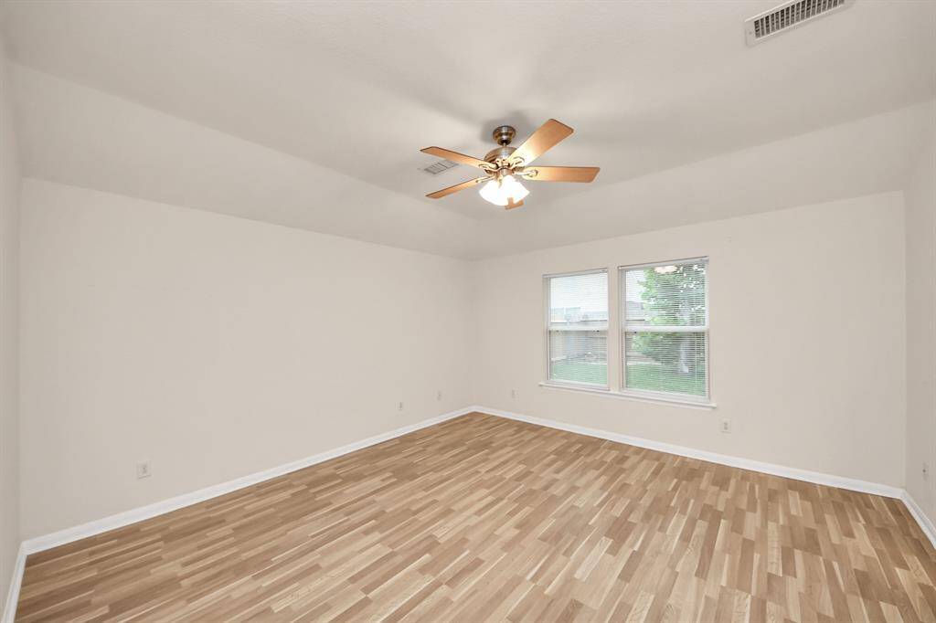 Primary Bedroom with Vaulted ceilings