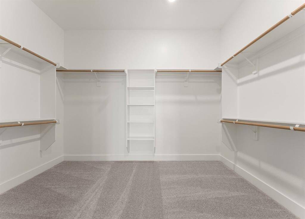 Walk-in Closet at Primary Bedroom