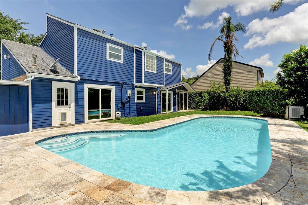 View of the sparkling pool! Sprinkler system front and back yard!