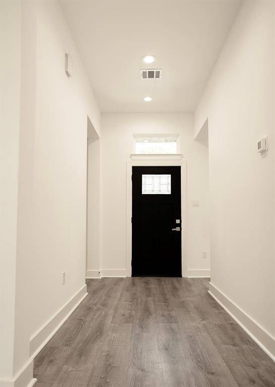 Entry into your new home with luxury flooring throughout entire home.