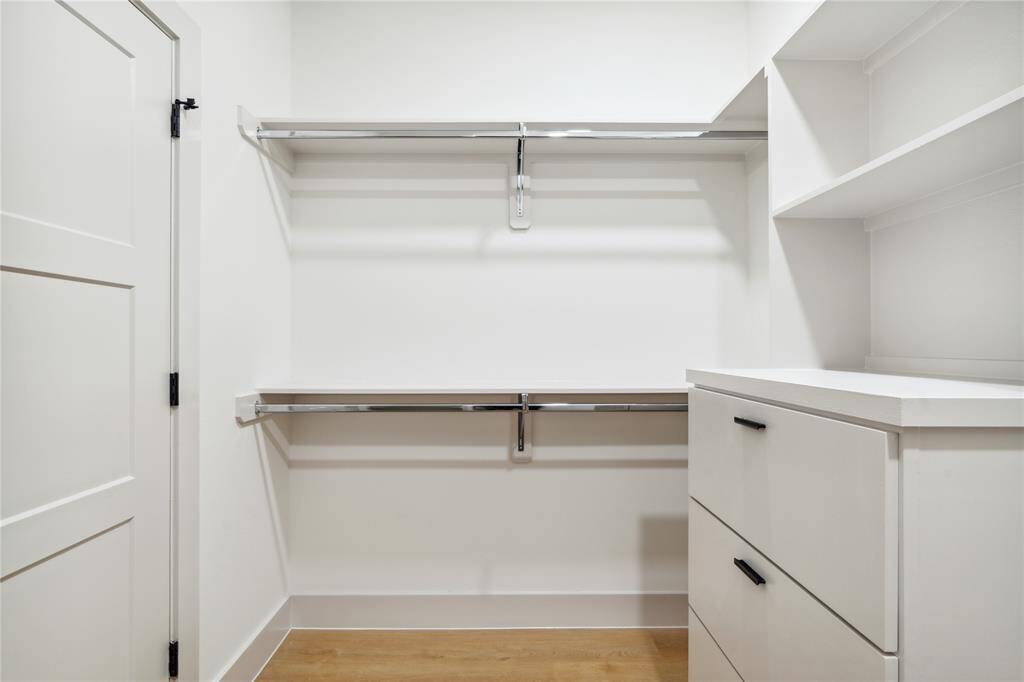 Double hanging rods and deep drawers give every item its place—so your wardrobe works as hard as you do.