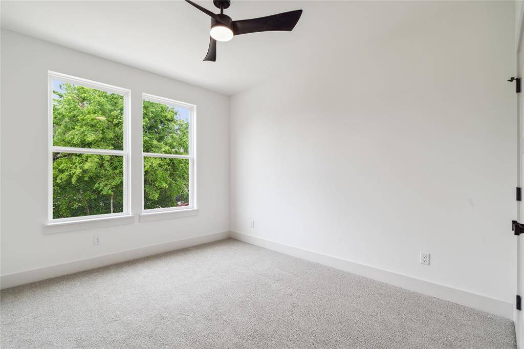 Secondary bedrooms are generously sized and full of natural light, offering comfort and flexibility for any lifestyle.