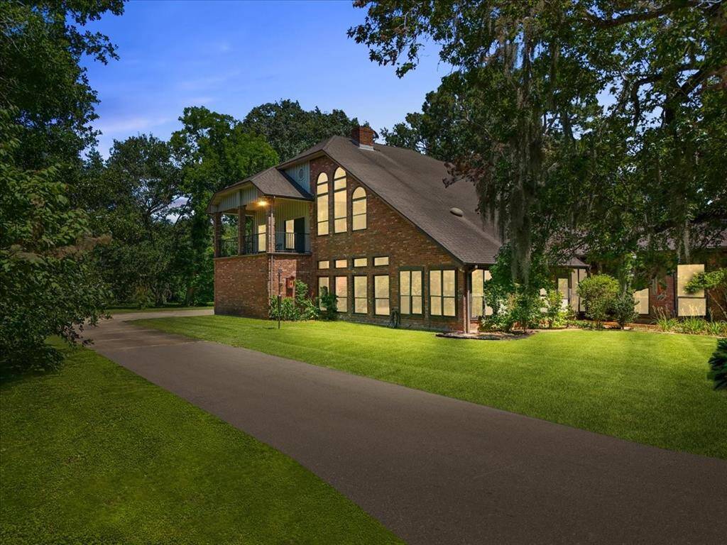 "A tranquil evening at home, where the perfect lawn meets the warm glow of twilight."