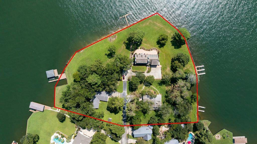 This amazing privately gated property sits proudly on the point!