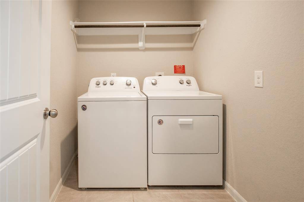 In-house utility room for your convenience.  The pantry is just opposite this room.