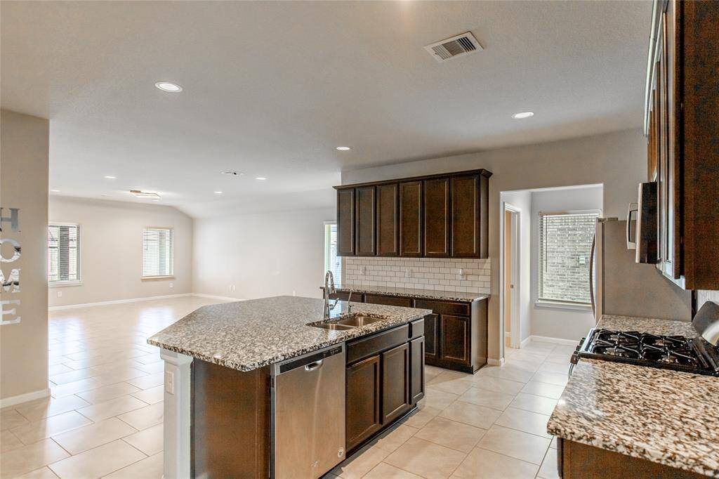 Open and welcoming floorplan for the kitchen, dining and living areas.  Perfect for entertaining and gatherings.