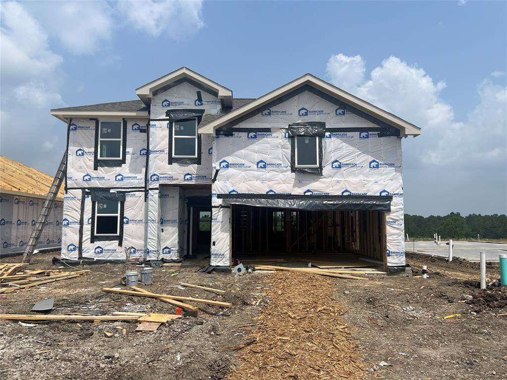 Two story home with 4 bedrooms, 3 baths, and 2 car garage.