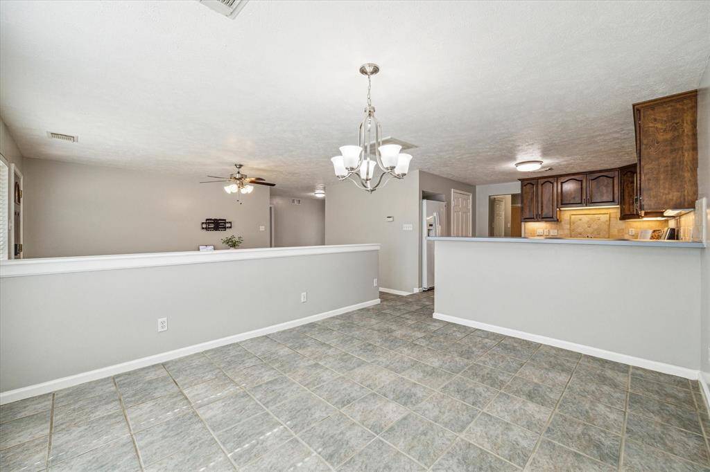 Dining room setup spacious enough for a formal table or a casual dining setup.