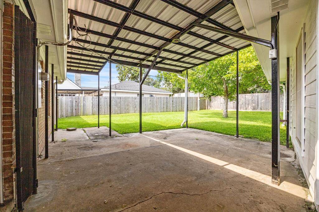 Covered porch in the back.