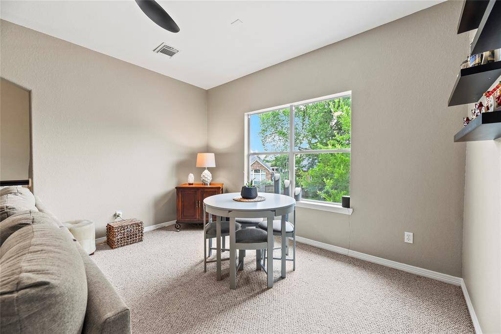The upstairs flex space offers a generous open layout, perfect for playtime, with plenty of room for kids’ toys, games, and creative activities. Bright windows fill the area with natural light, creating a cheerful environment that can easily grow and adapt with your family’s needs.