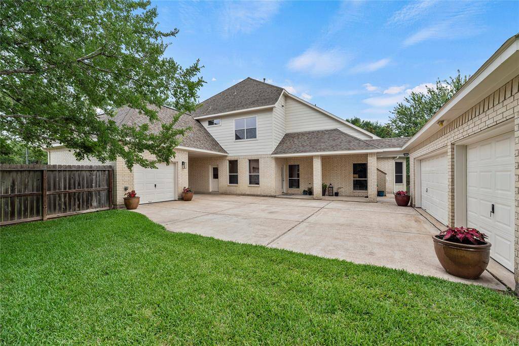 Park vehicles and toys in the attached 4-car garage! Store your classic convertible for romantic weekend getaways, or finish restoring your sentimental high school ride in the comfort of your huge garage!