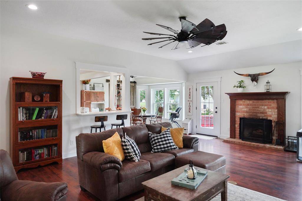 Open layout connects the living room to the kitchen and breakfast area—great for entertaining or everyday comfort.