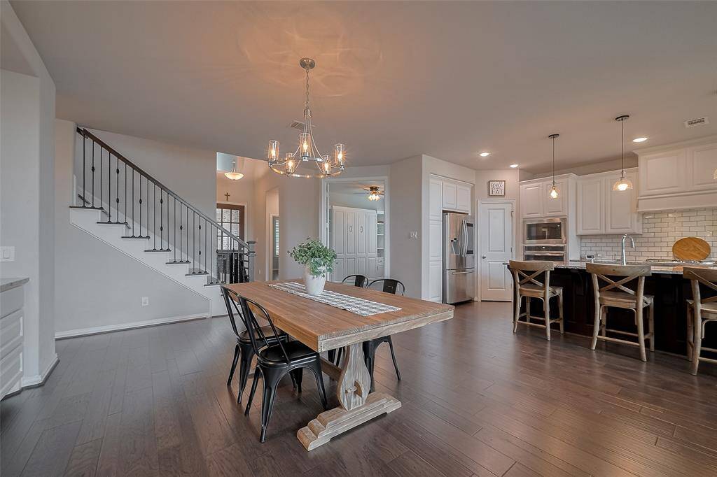 From the dining area, you can see the dedicated office straight ahead, framed beautifully by the French doors