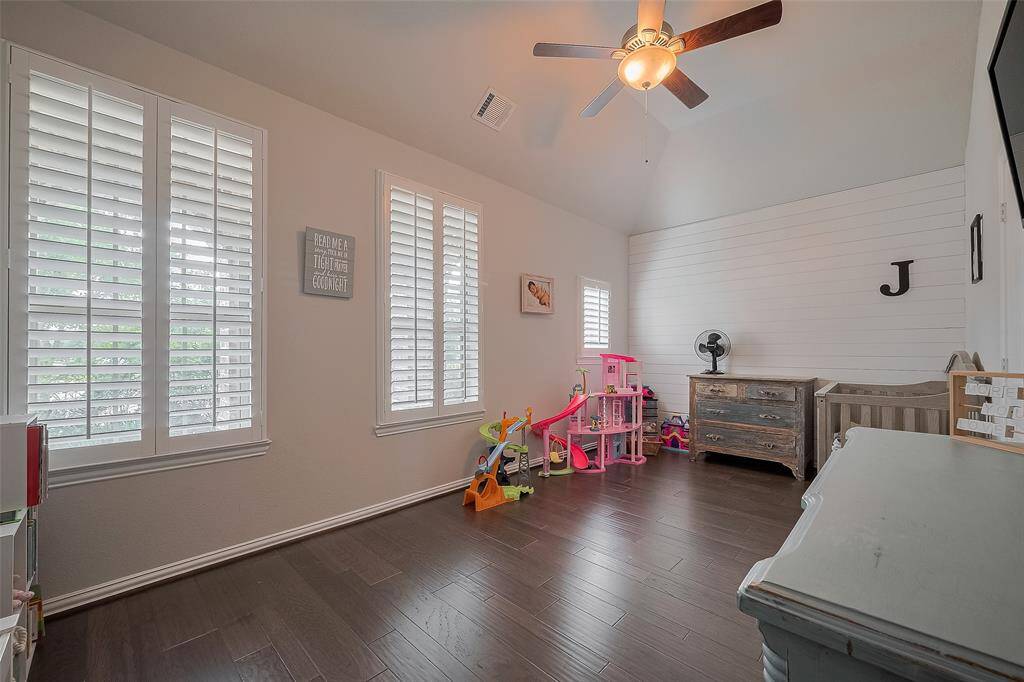 A highly sought-after feature of this floorplan is the secondary bedroom located on the main floor. Positioned at the front of the home, it offers added privacy and convenience