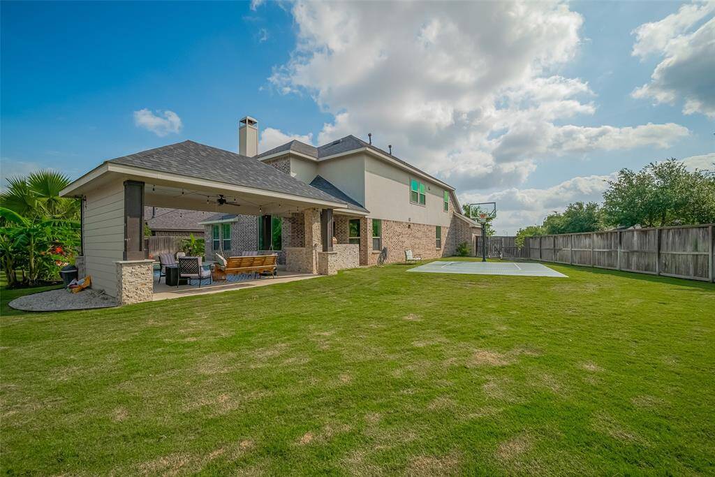 This yard is large enough to accomodate ALL the sports!  The private basketball court has an upgraded sport court and premium basketball hoop installed