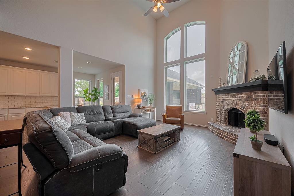 And just look at those unobstructed views through the soaring two-story windows—no back neighbors means you’ll enjoy complete privacy and a full, uninterrupted view your beautiful backyard