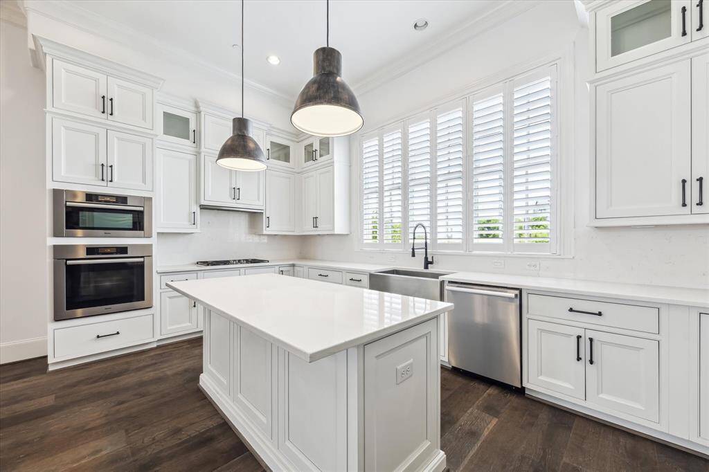 Miele appliances, Convection Microwave Oven, Under cabinet lighting and picture perfect sink window.