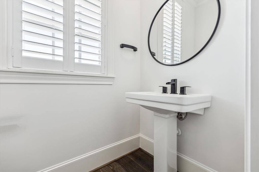 2nd floor powder bath is located in the corner- private and tucked away from the living space.
