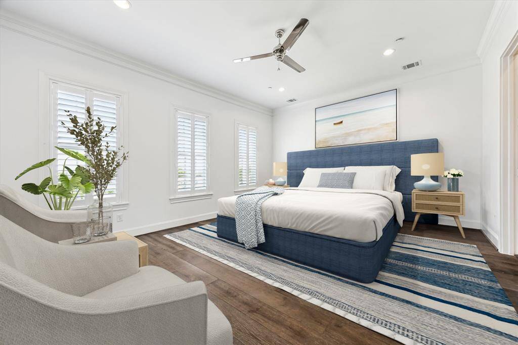 The expansive primary suite features unobstructed west facing views of the bayou through oversized triplicate windows. Custom Stainless steel ceiling fan keeps the air circulating.