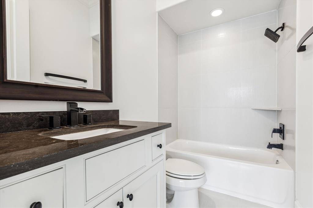 4th floor ensuite bathroom with sleek modern plumbing fixtures.