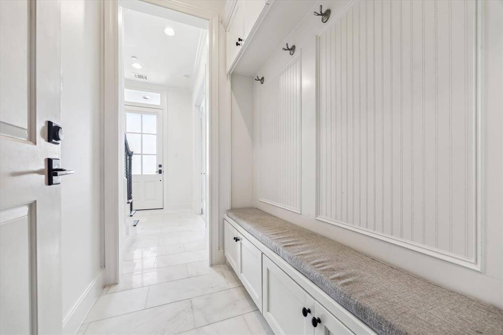 Light-filled front and rear entry flow seamlessly together.