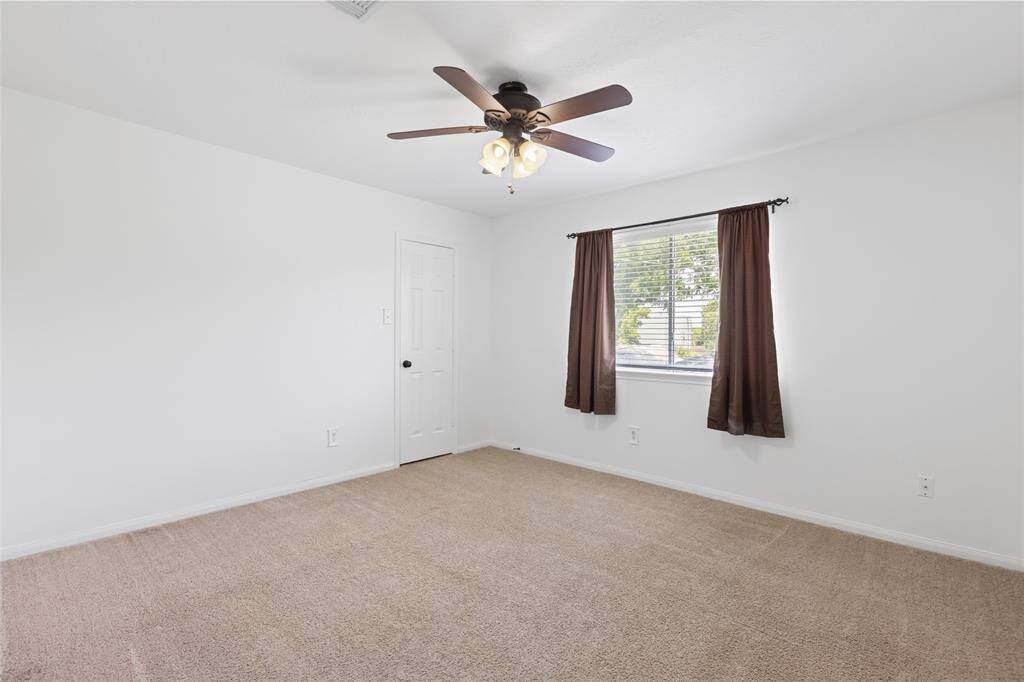 Secondary Bedroom with a large walk in closet