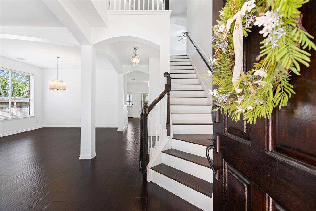 Such a timeless entryway. To the right is a formal sitting room and the dining room