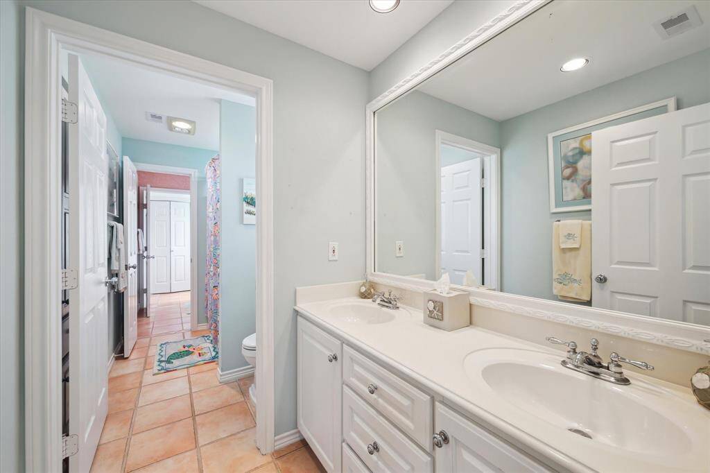 Utility room/Laundry room on Main floor.  Easy access to Great Room and Kitchen and includes Kenmore washer and dryer