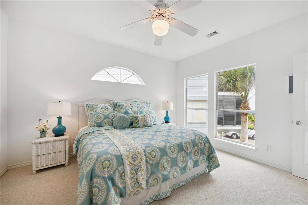 Study/Media room on top floor with built-in shelving, Hardwood Flooring, Gun safe in closet