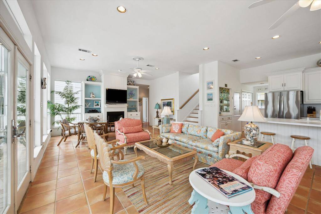 Main Floor- Open Concept -Great Room|Dining Room| Kitchen - what a great space to entertain friends and family. Ceramic tile flooring unite the room, modern lighting and fans.