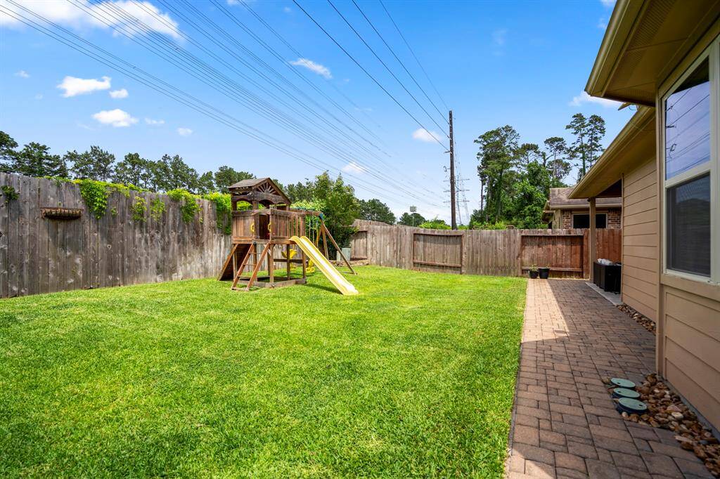 Here’s another view of the spacious backyard, where the privacy of no rear neighbors lets you enjoy peaceful, uninterrupted outdoor moments every day.