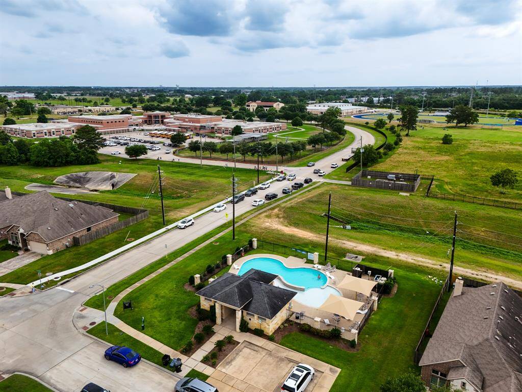 This aerial highlights the community pool close by, with Zwink Elementary School just around the corner—offering convenient access to great neighborhood amenities and schools.