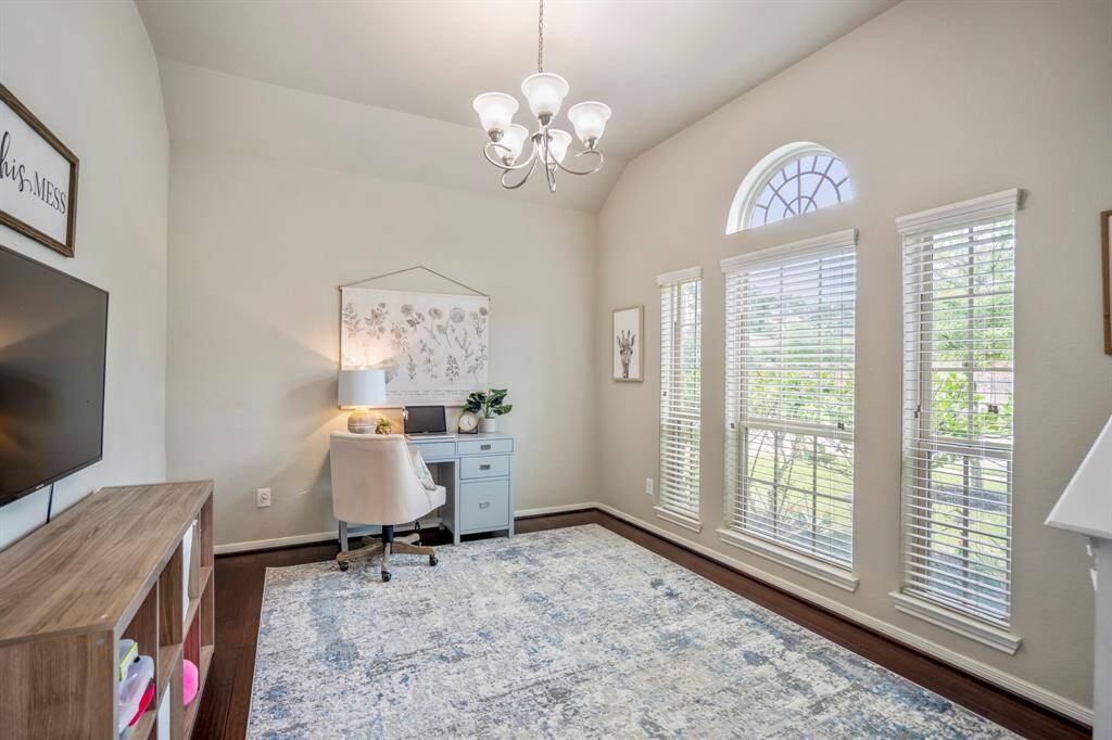 This versatile flex space, with large windows overlooking the front yard, offers a bright spot for a home office, formal dining, or whatever suits your lifestyle.